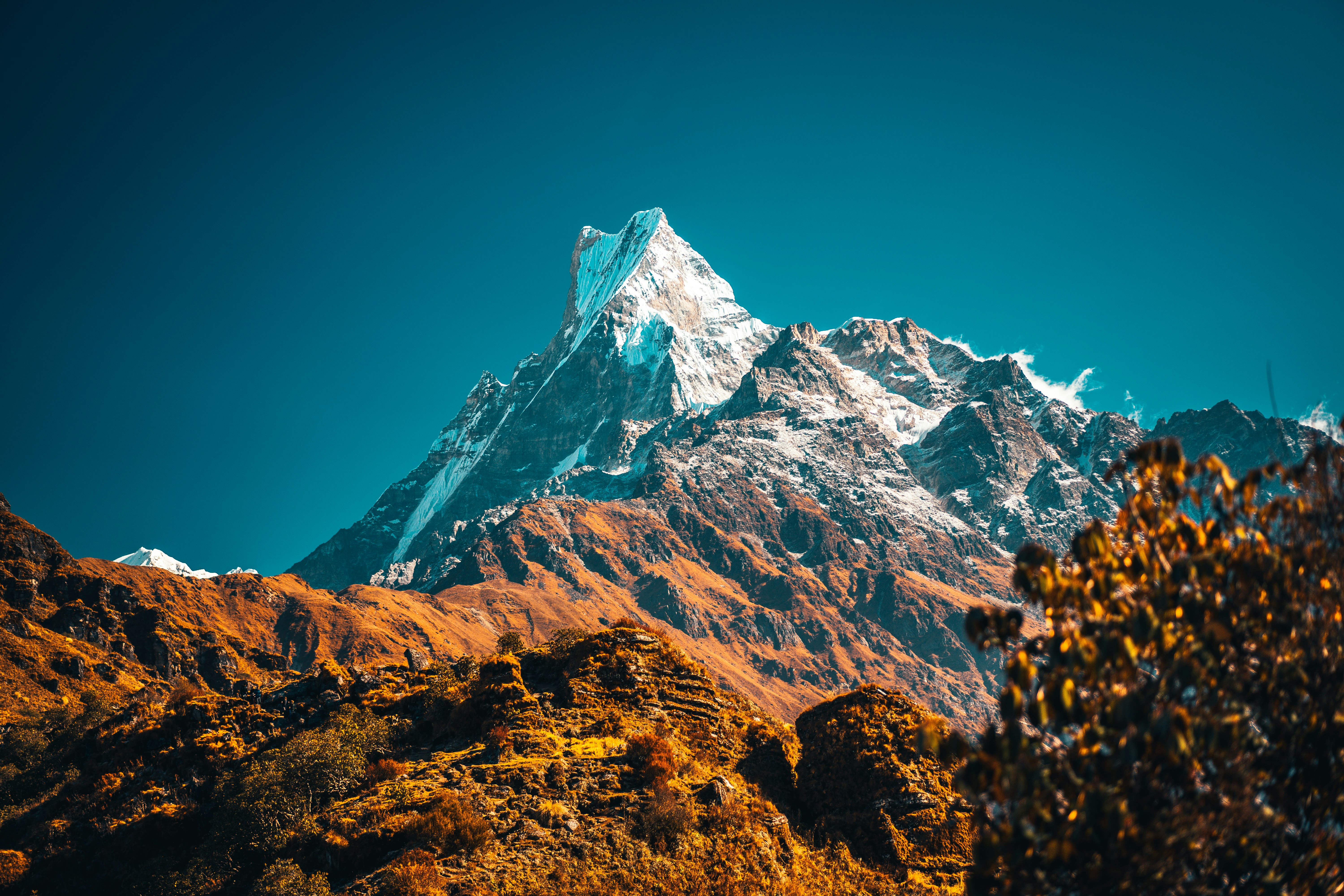 brown and white mountain under blue sky during daytime